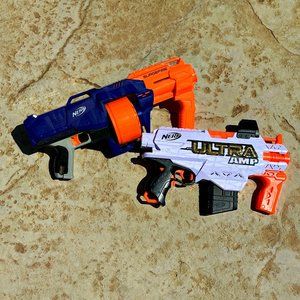 Lot of 2 Large Nerf Guns: White Motorized Ultra Amp & Blue SurgeFire Elite